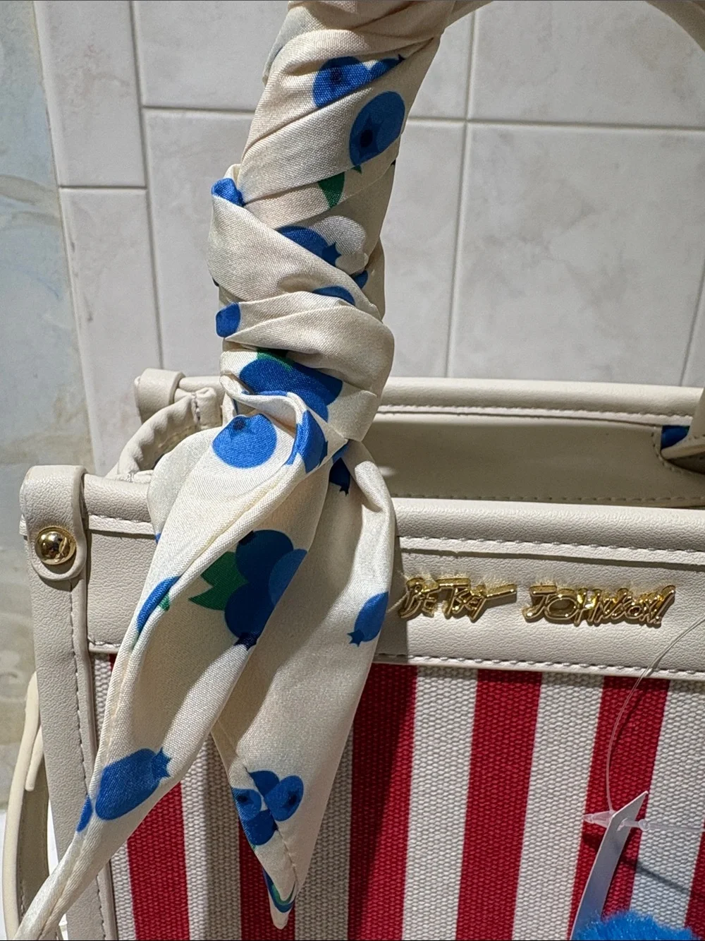 Betsey Johnson Cream and Red Striped Top-Handle Satchel with Blueberry Pom Charm